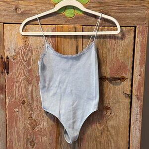 Light Blue Ribbed Bodysuit with silver flecks. Size small. No tags